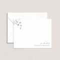 Simple Floral personalized notecards by Blú Rose, white flat notecard with delicate eucalyptus greenery and 'from the desk of Margot Washington', shown with a coordinating white envelope