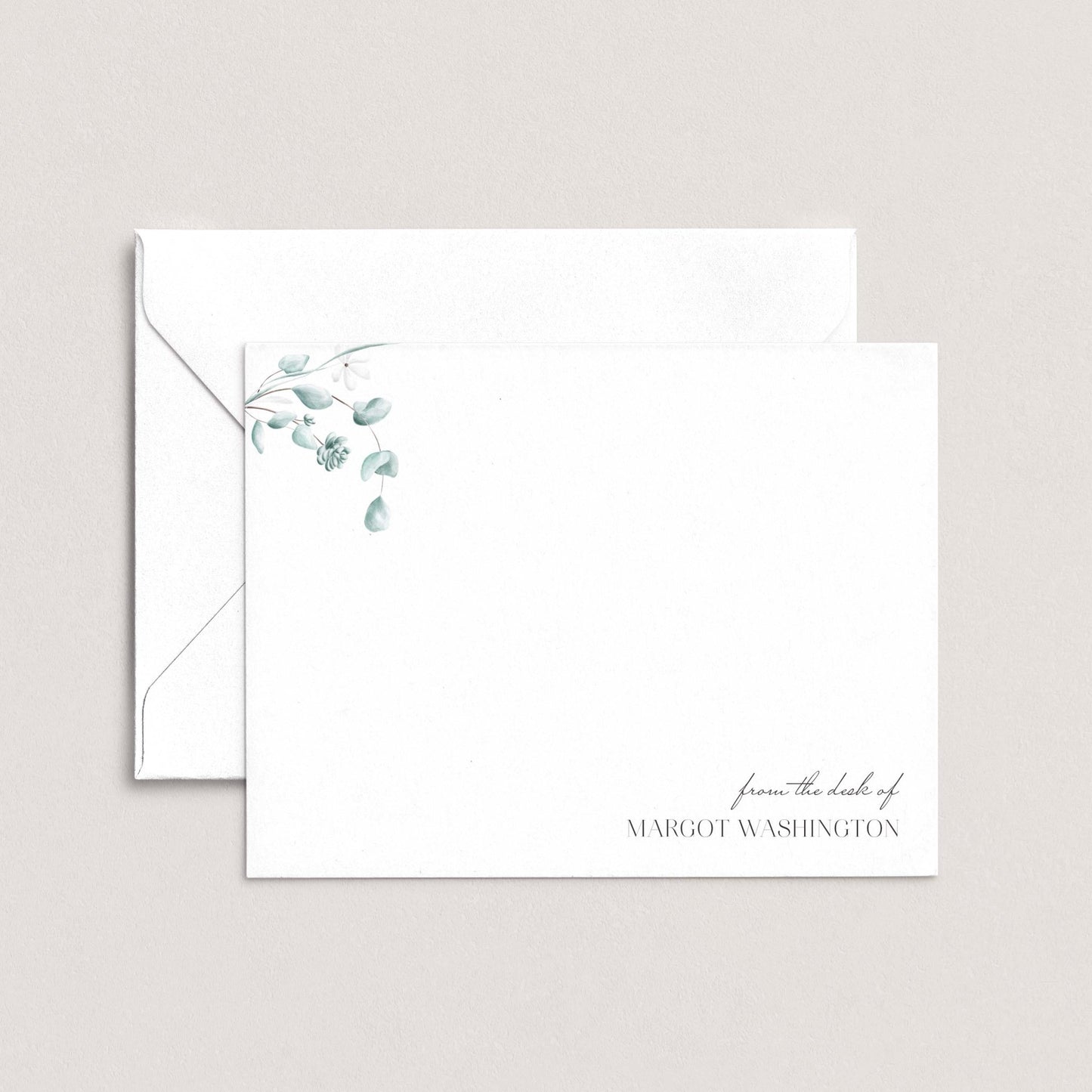 A white envelope with a floral design on the left side and a personalized message on the right side.