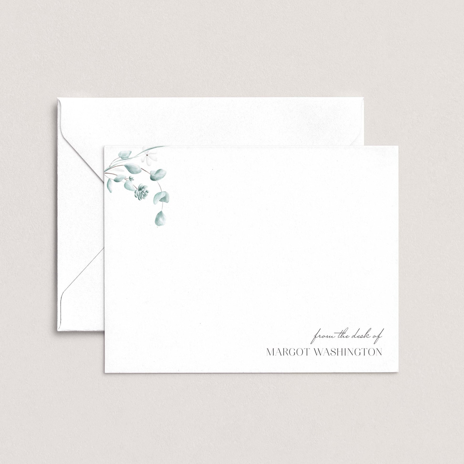 A white envelope with a floral design on the left side and a personalized message on the right side.