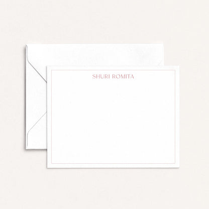 Personalized flat notecard with Ironroot red border and name in serif font, shown with matching envelope on neutral background.