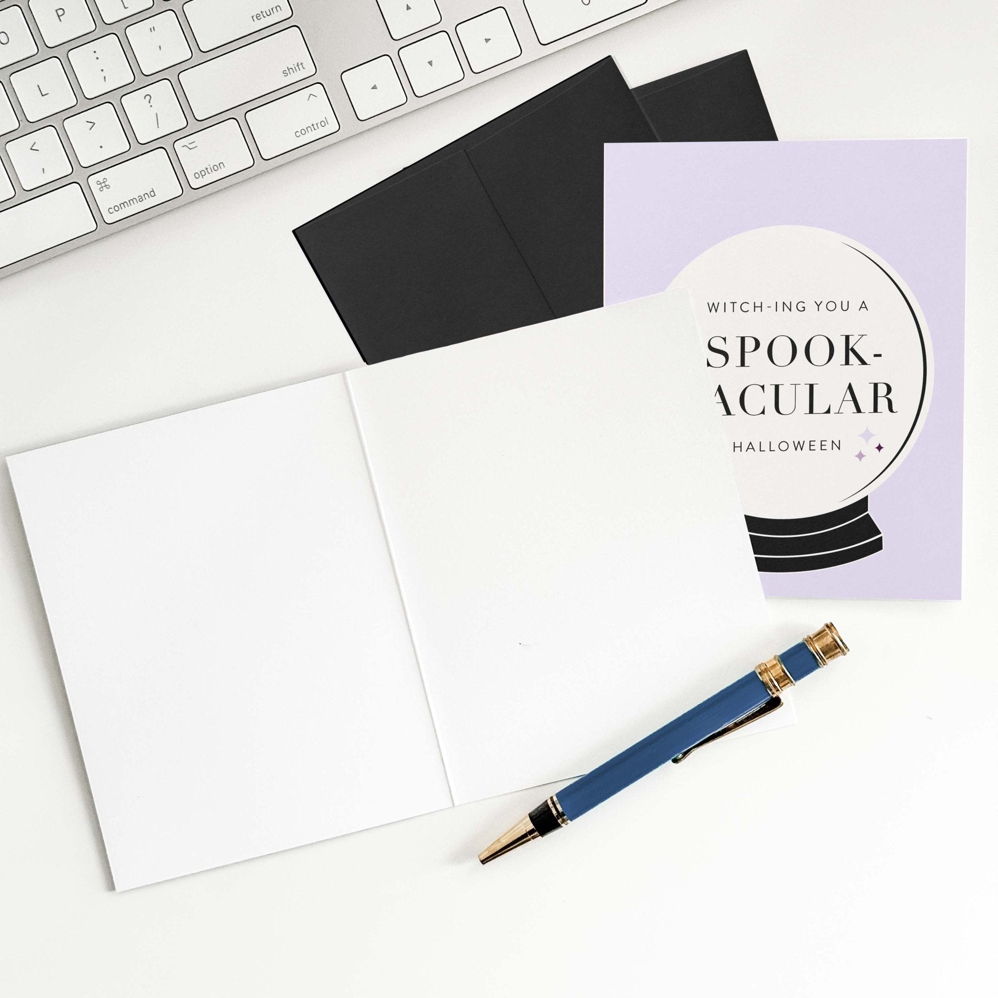 Funny witchy Halloween greeting card shown with envelope and pen, perfect for sending spooky-chic vibes.