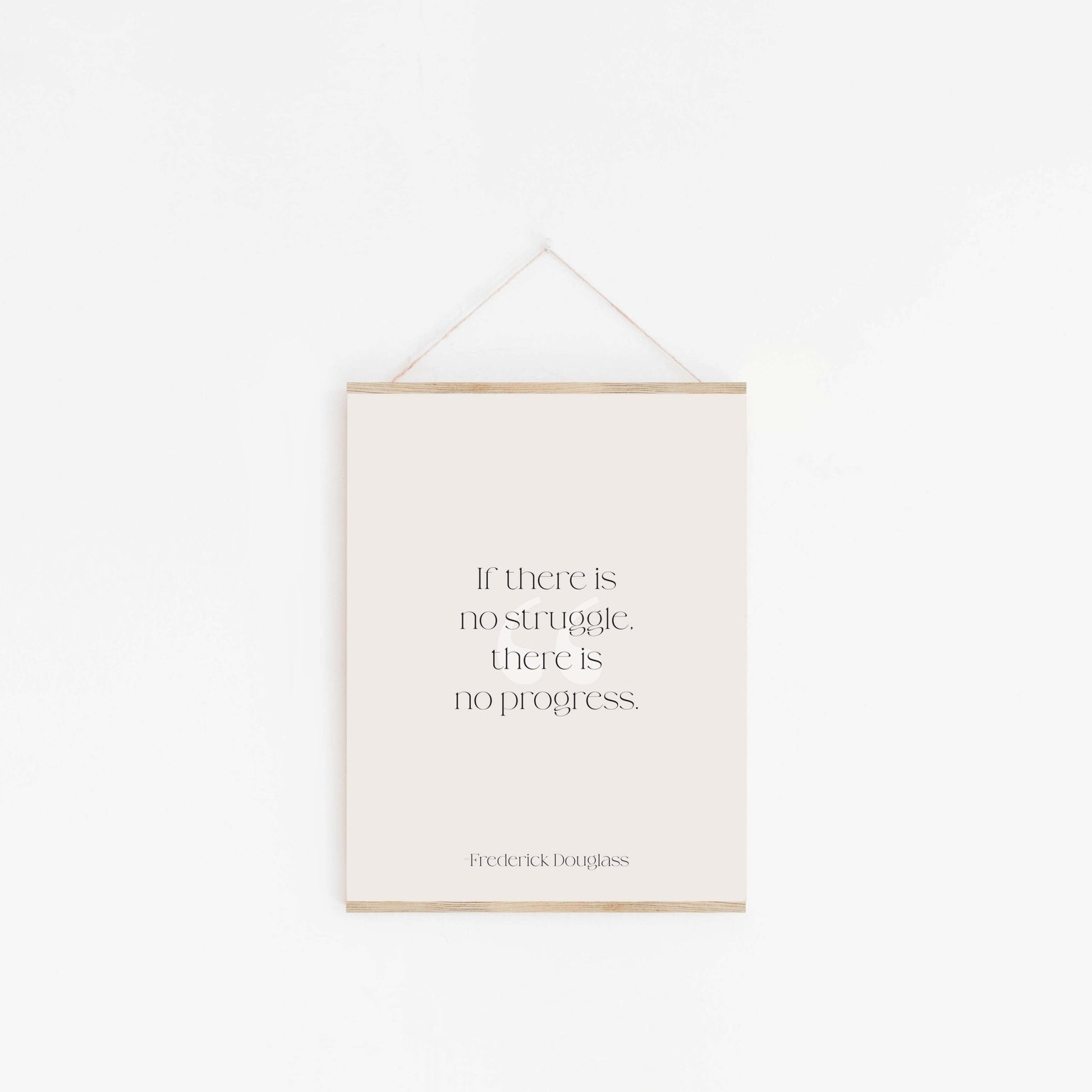 Minimal Frederick Douglass quote wall hanging with wood frame and simple cord display