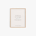 Minimalist framed Frederick Douglass quote print in neutral tones on white wall