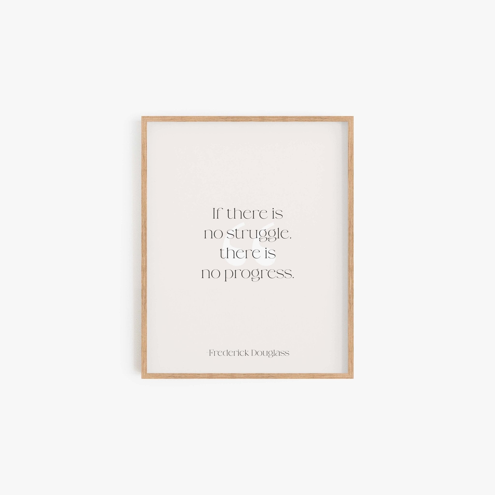 Minimalist framed Frederick Douglass quote print in neutral tones on white wall