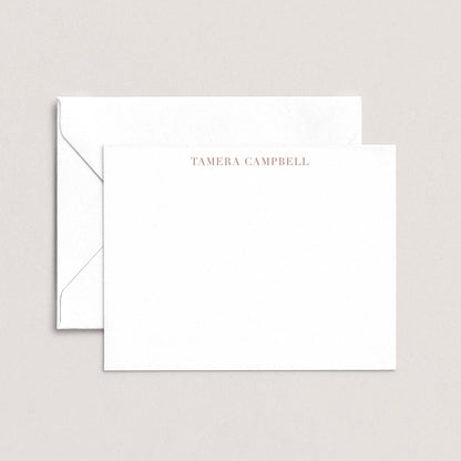 A white envelope with the name 'TAMERA Campbell' printed on it, placed on top of a plain white background.