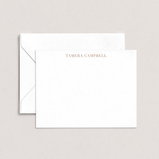 A white envelope with the name 'TAMERA Campbell' printed on it, placed on top of a plain white background.