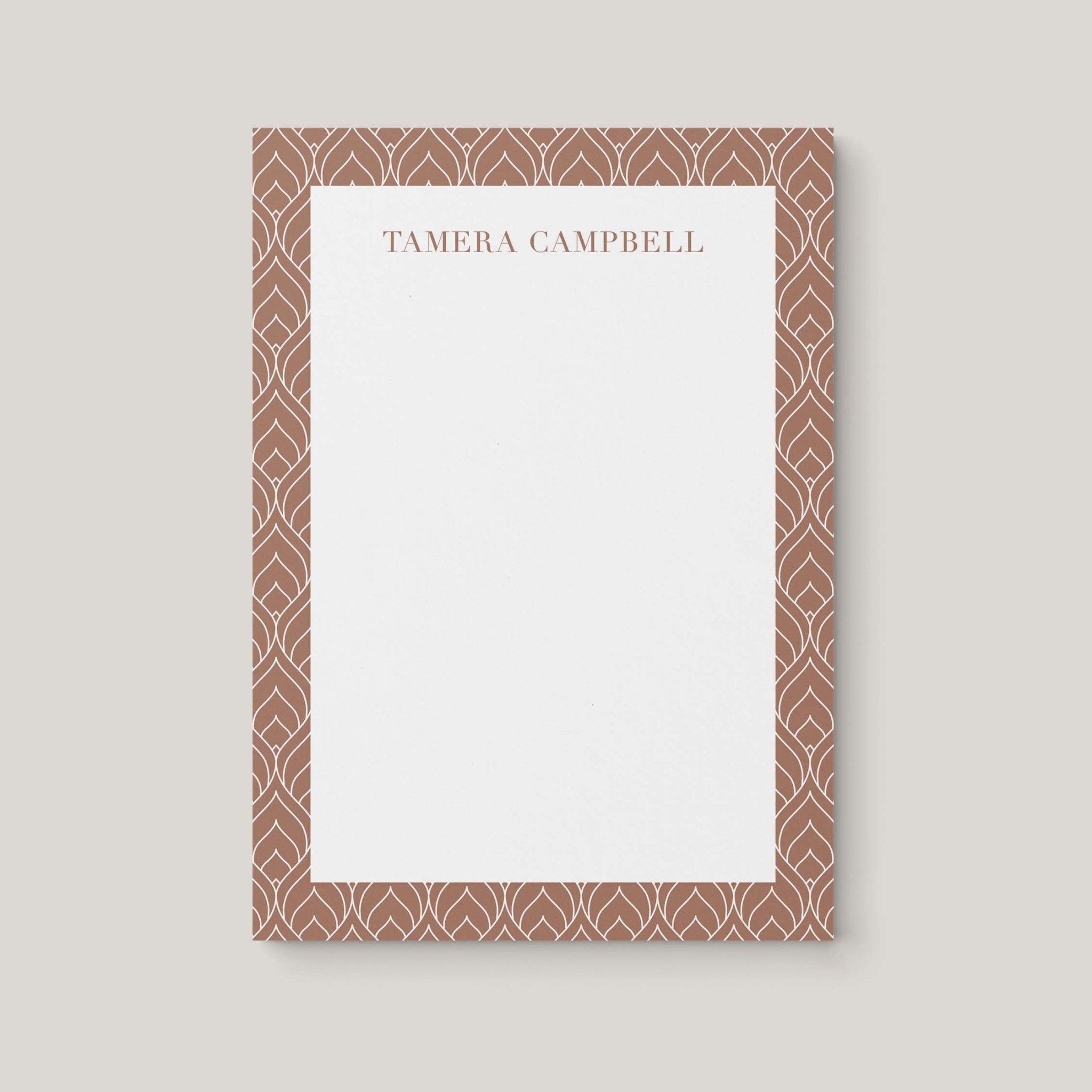 Tamera Pattern personalized notepad by Blú Rose, cream notepad with a taupe teardrop-patterned border and the name 'Tamera Campbell'