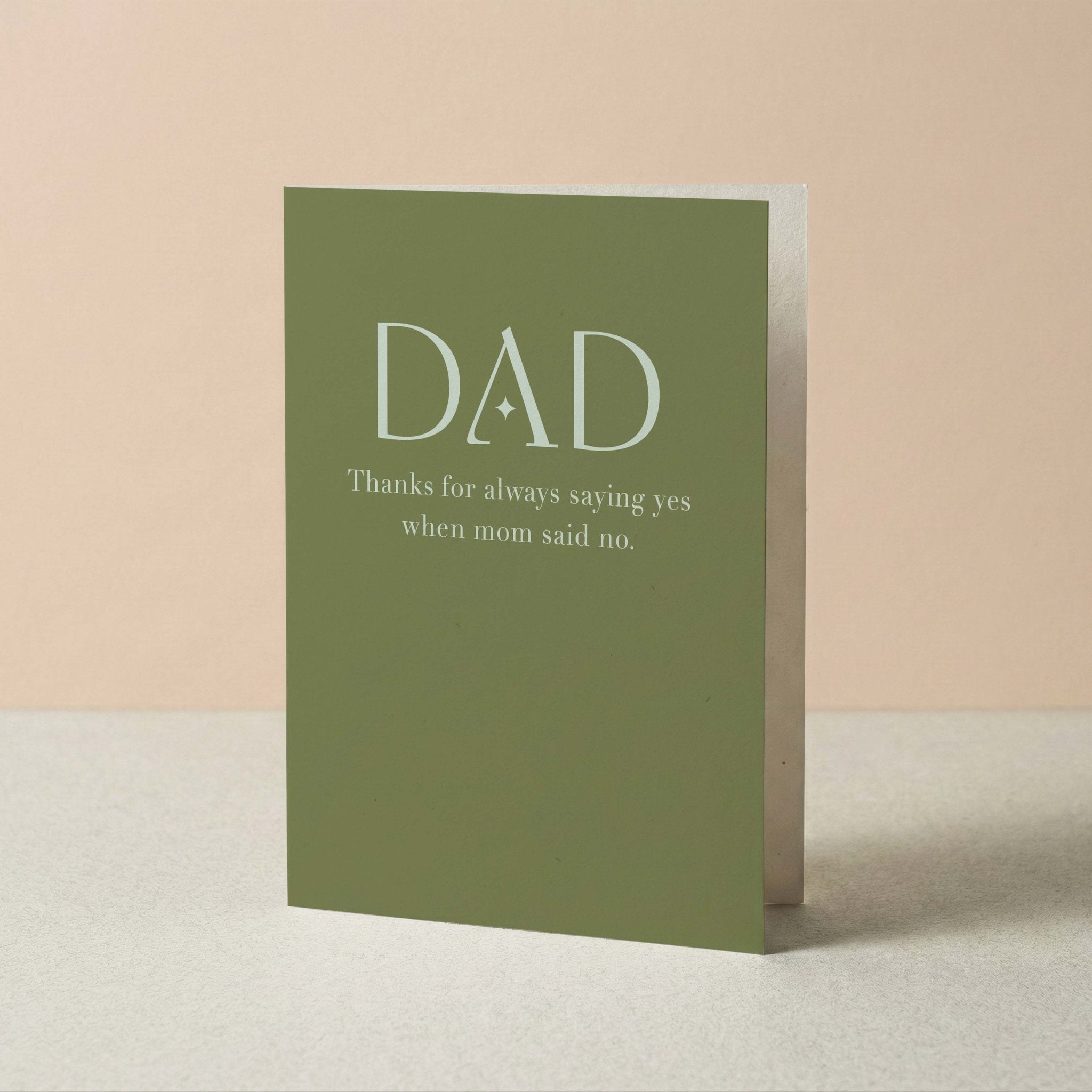 Thanks for Saying Yes dad card by Blú Rose standing upright, sage green card with cream typography on a neutral background