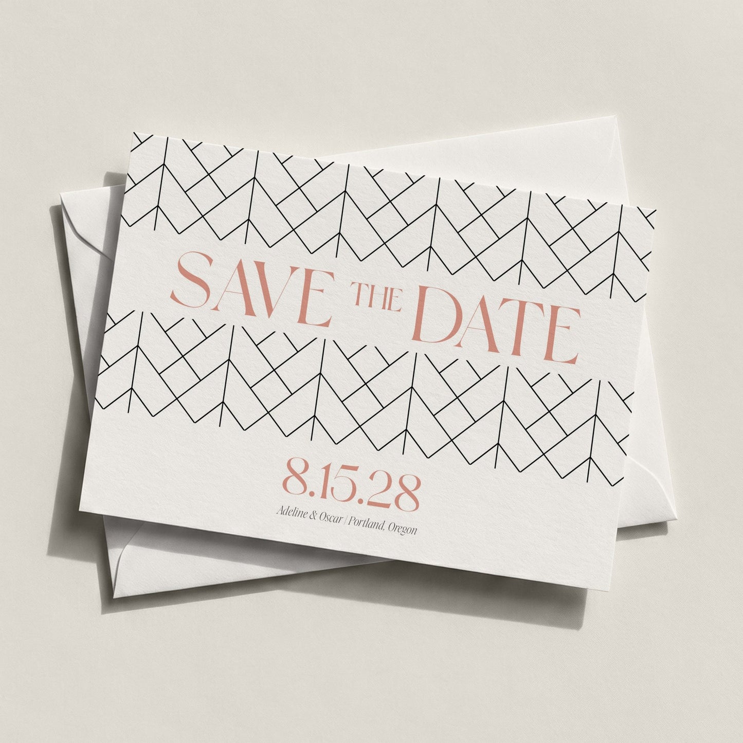 The Lattice Save the Date card by Blú Rose displayed at an angle stacked on a white envelope against a neutral background