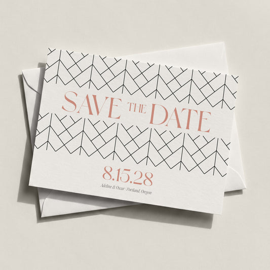 The Lattice Save the Date card by Blú Rose displayed at an angle stacked on a white envelope against a neutral background