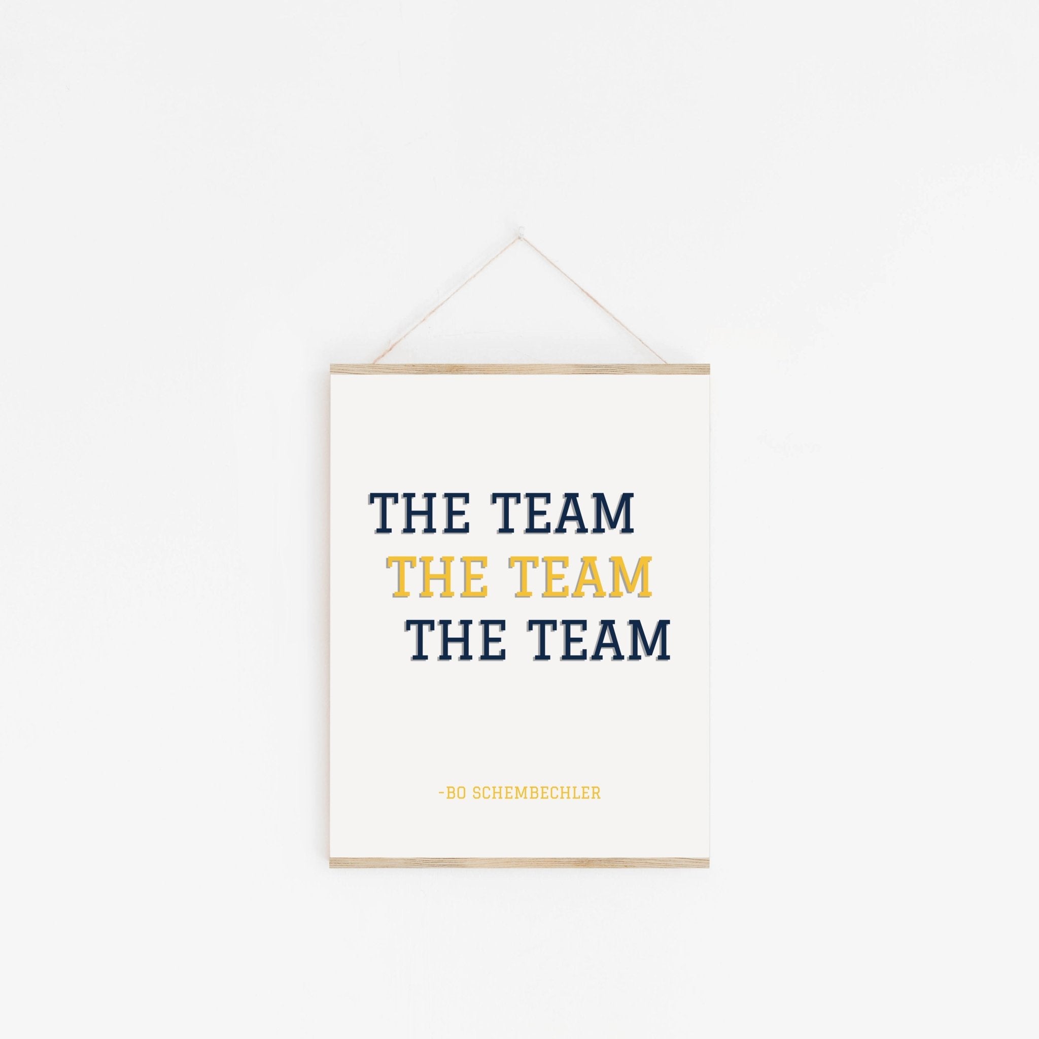 Bo Schembechler sports quote wall art hanging from wooden hanger