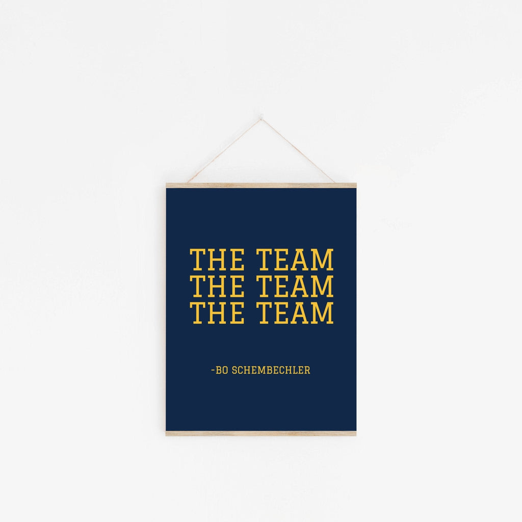 Michigan fan quote poster hanging from wooden hanger