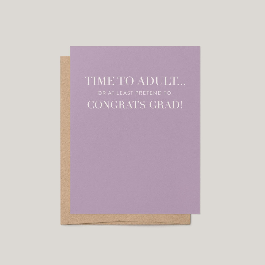 Time to Adult funny graduation greeting card by Blú Rose, lavender card with white serif congrats grad text, shown with kraft envelope