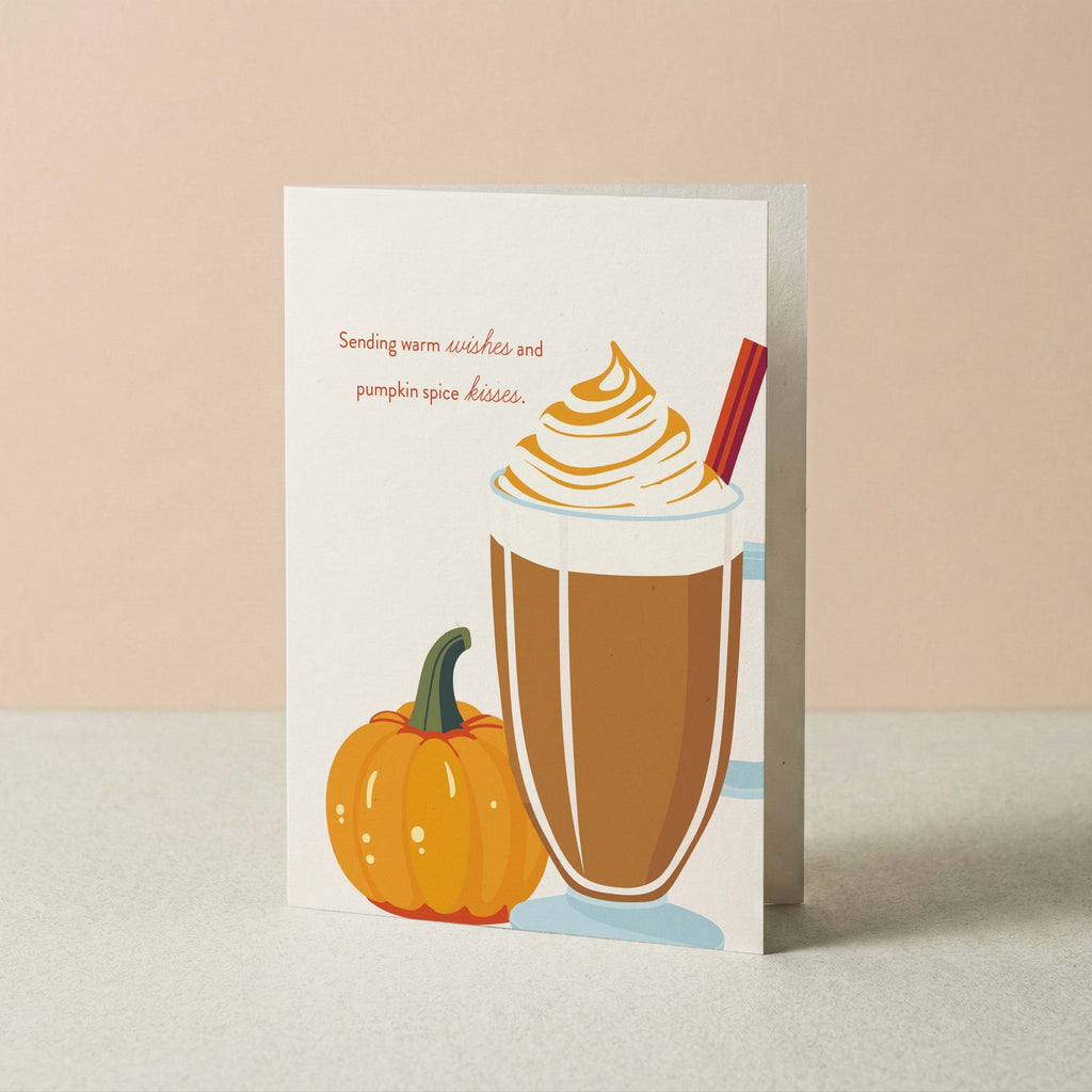 Warm Wishes & Pumpkin Spice Kisses autumn card by Blú Rose standing upright, illustrated latte and pumpkin design on a neutral background