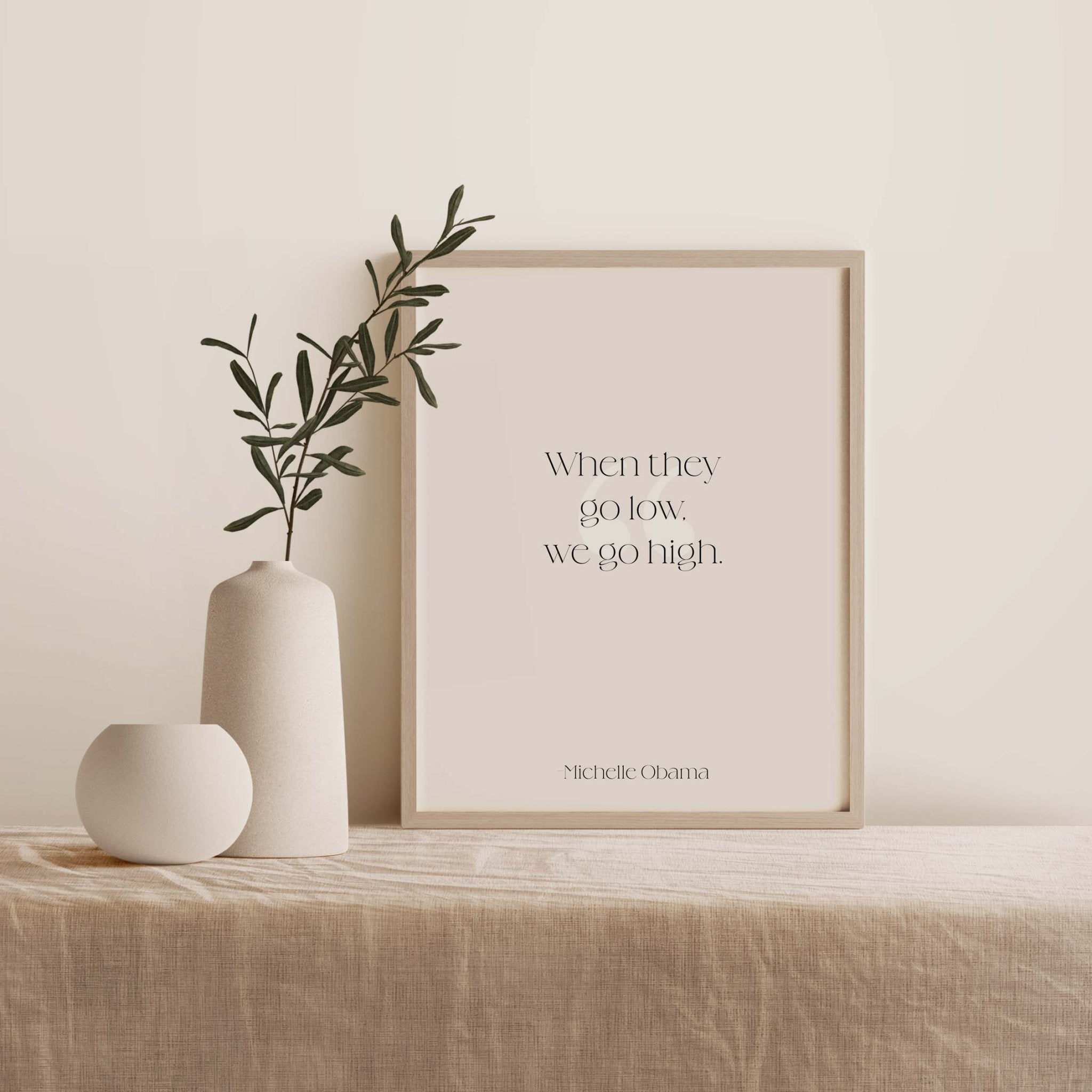 Michelle Obama quote art print styled with neutral decor on table