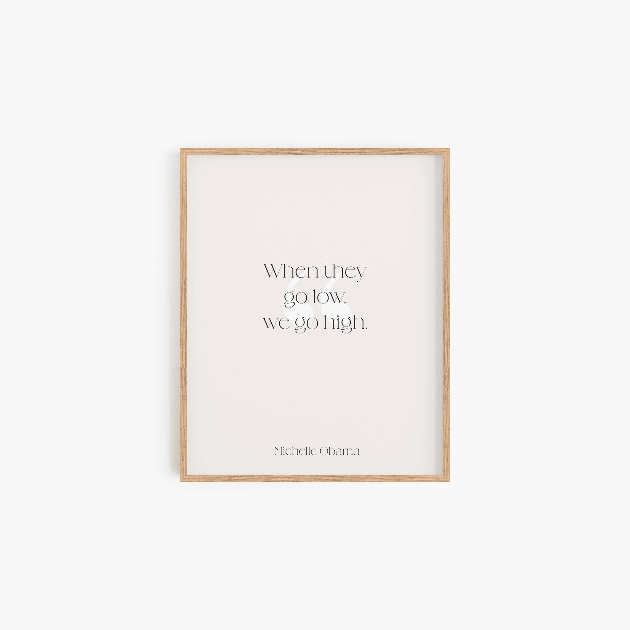 When They Go Low We Go High quote art print in natural wood frame