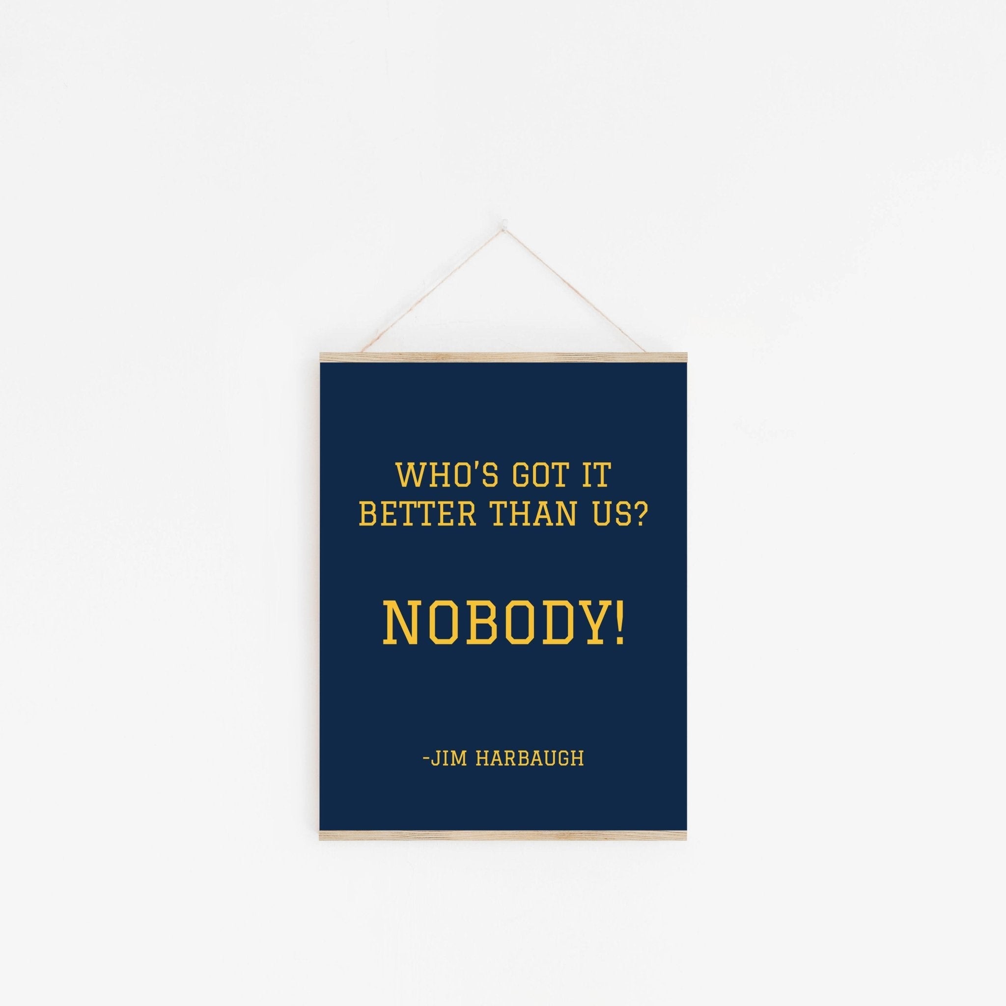 Michigan fan wall art poster hanging from wooden hanger