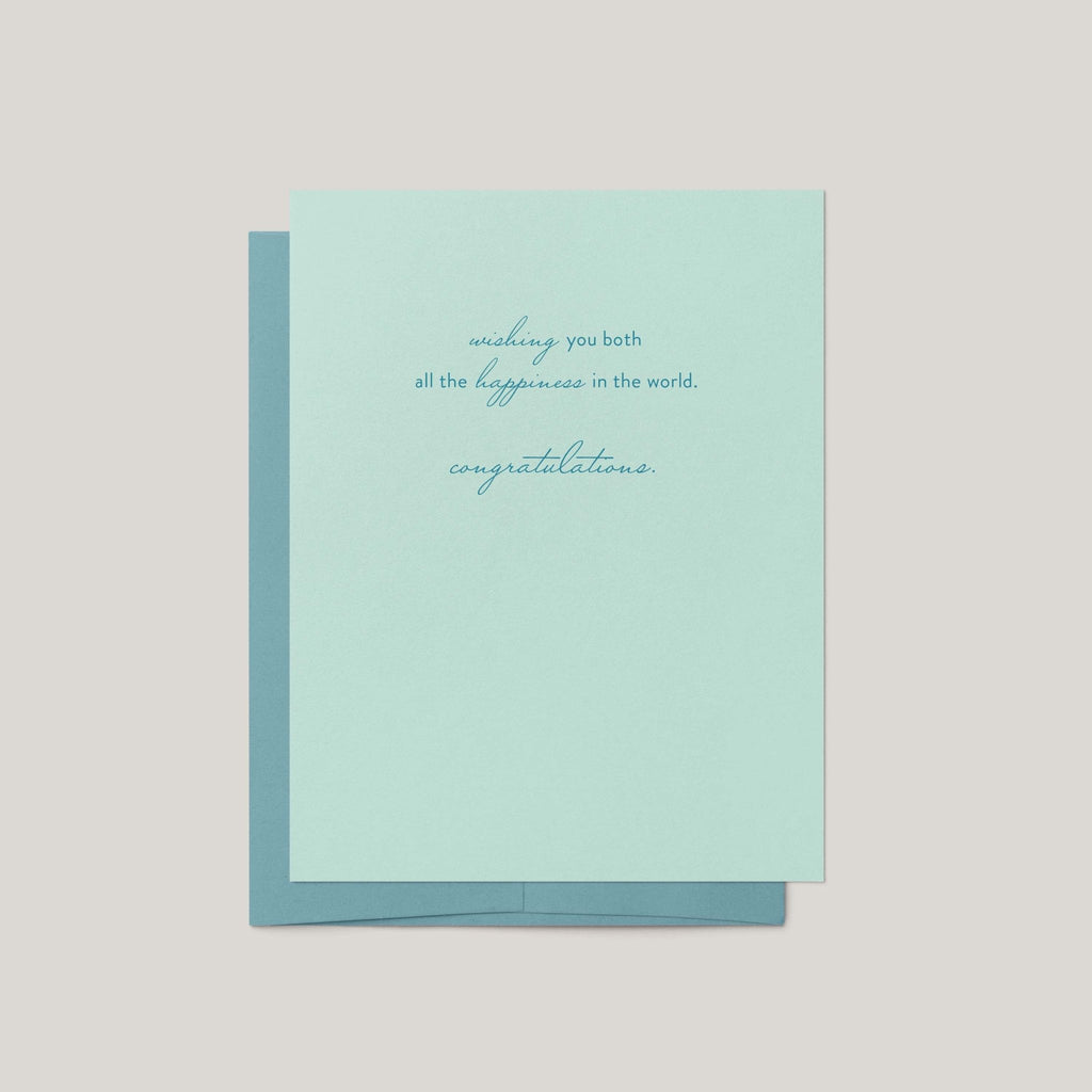 A mint green congratulations card with elegant cursive text, shown with a matching teal envelope against a neutral light gray background.