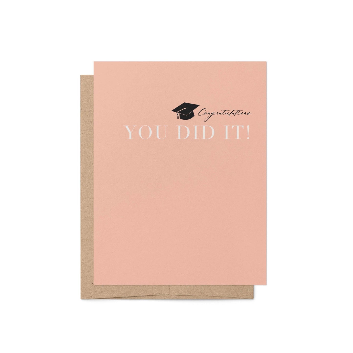 Modern graduation card with peach background and kraft envelope