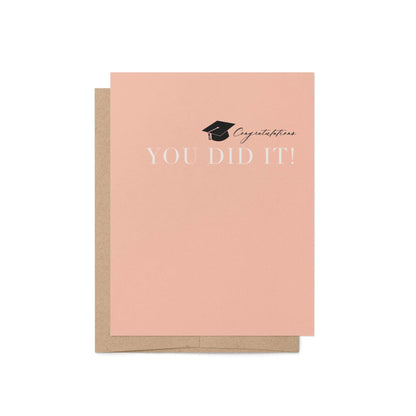 Modern graduation card with peach background and kraft envelope