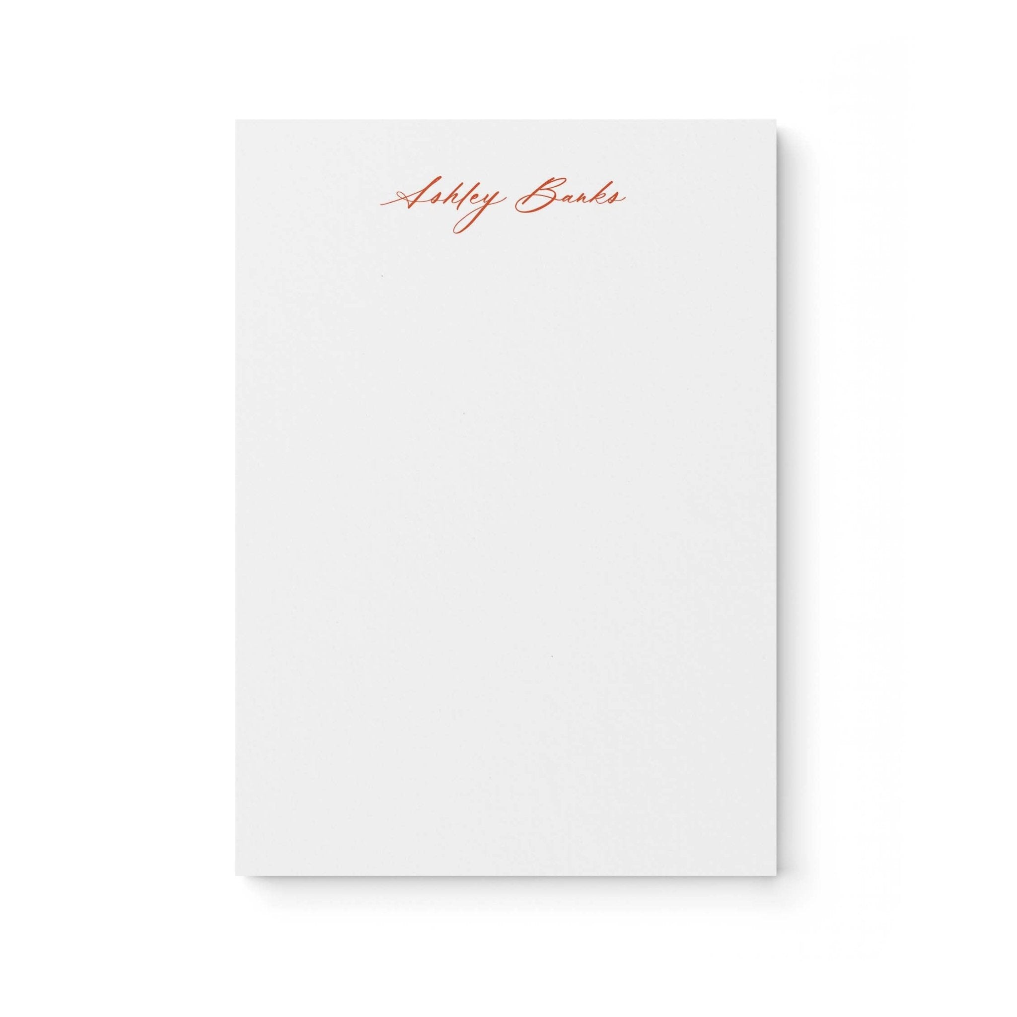 Ashley stationery set by Blú Rose, white notepad personalized 'Ashley Banks' in rust script