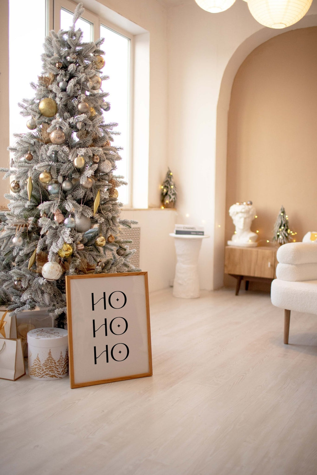 Modern Ho Ho Ho Christmas art print styled in festive living room