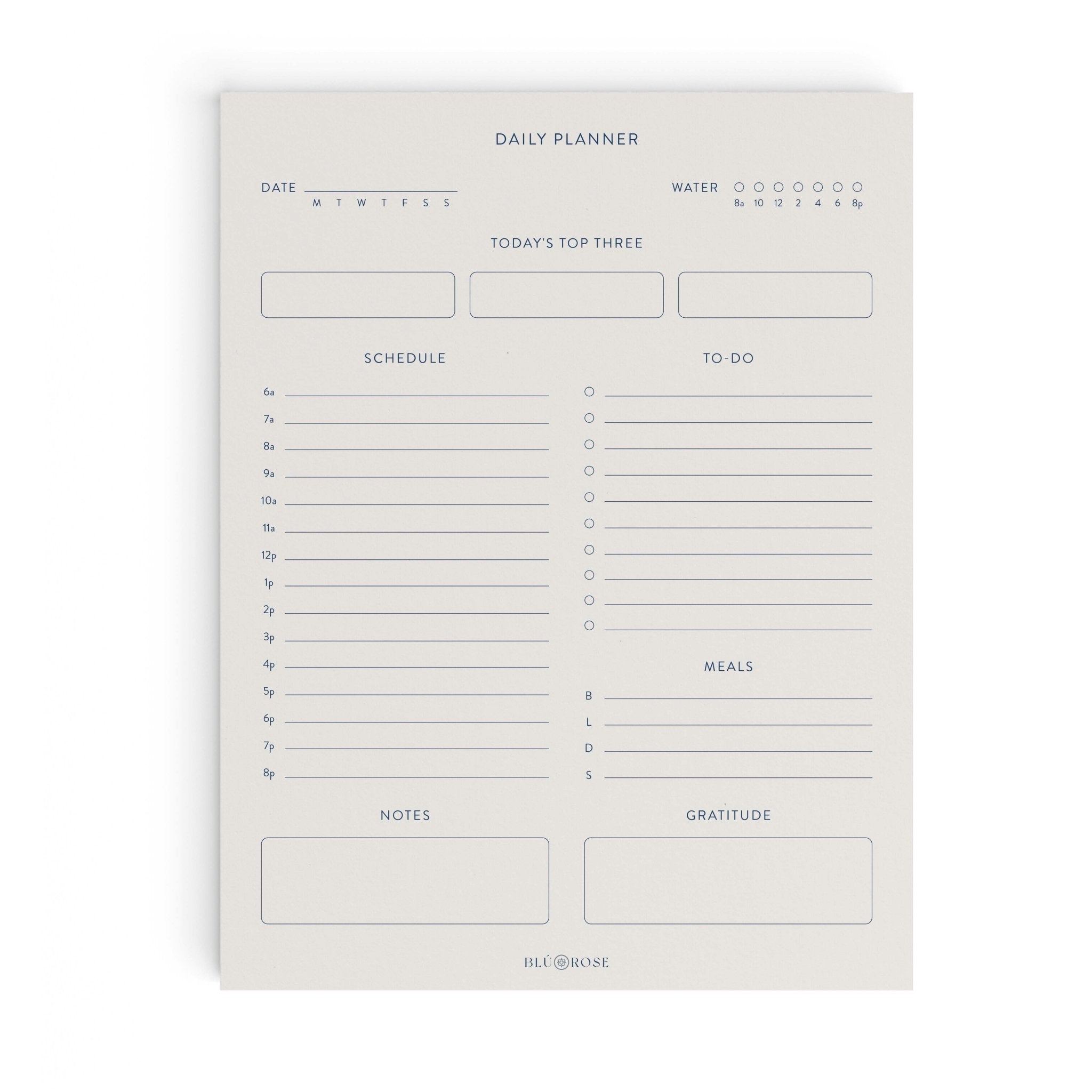 Minimalist Daily Planner notepad by Blú Rose, undated daily planner page with schedule, to-do, top three, meals, notes and gratitude sections in navy