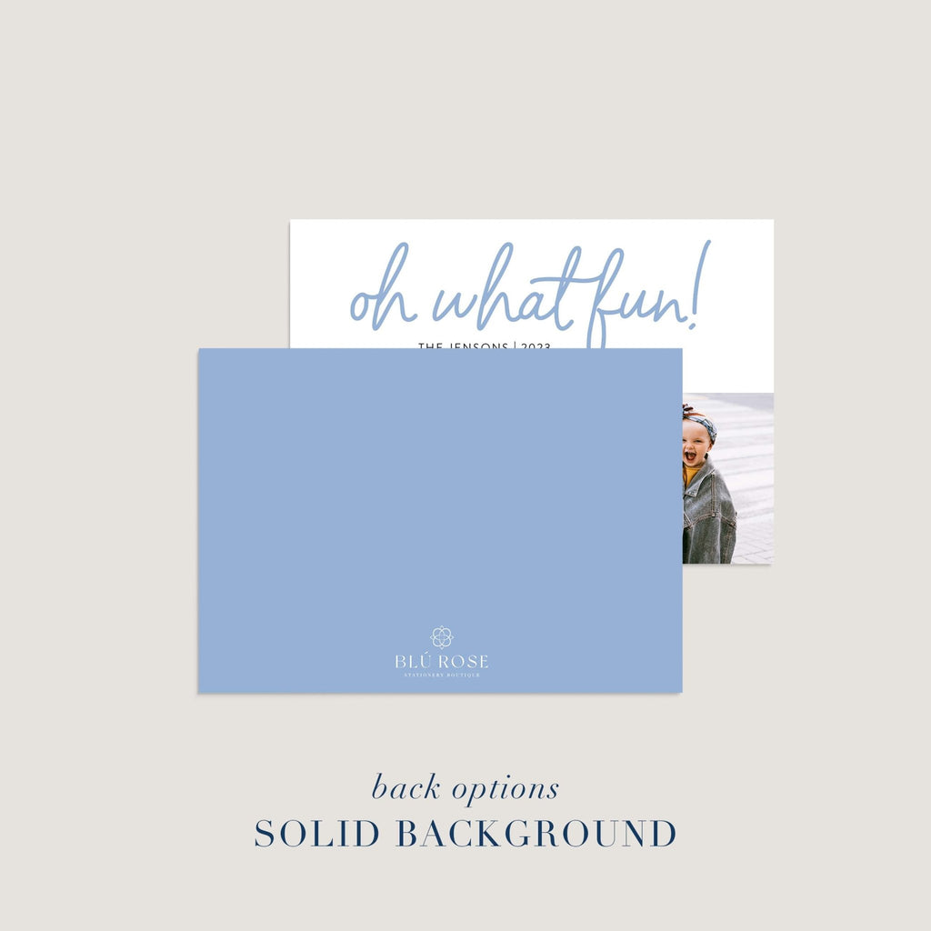Back design option for Oh What Fun holiday photo card with solid blue background.